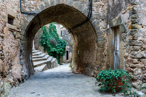 Paisajes y rincones del pequeño pueblo de Madremanya, en la comarca del Gironès, en el noreste de Catalunya photo