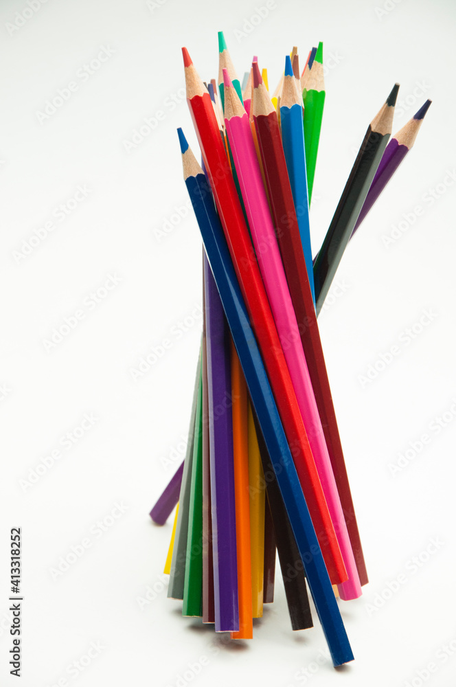 Fototapeta premium colored pencils on a white background. education concept. illustration of training.