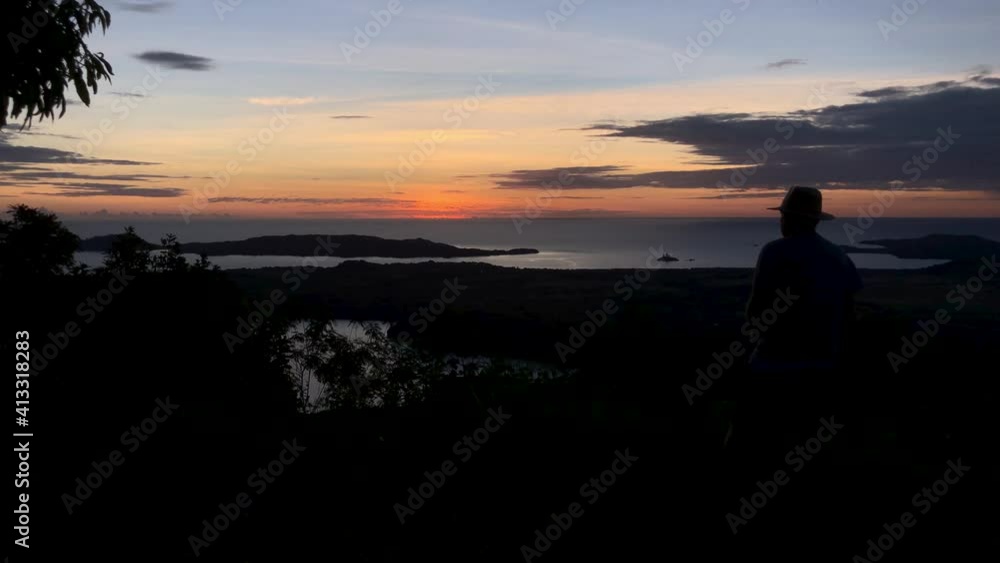Mont Passot the highest point on the island of Madagascar. Beautiful sunset where the sky turns pink, red, orange, and even blue. Presence of lakes set in a lush tropical nature. Mont Passot the highest point on the island of Madagascar. Beautiful sunset where the sky turns pink, red, orange, and even blue. Presence of lakes set in a lush tropical nature.