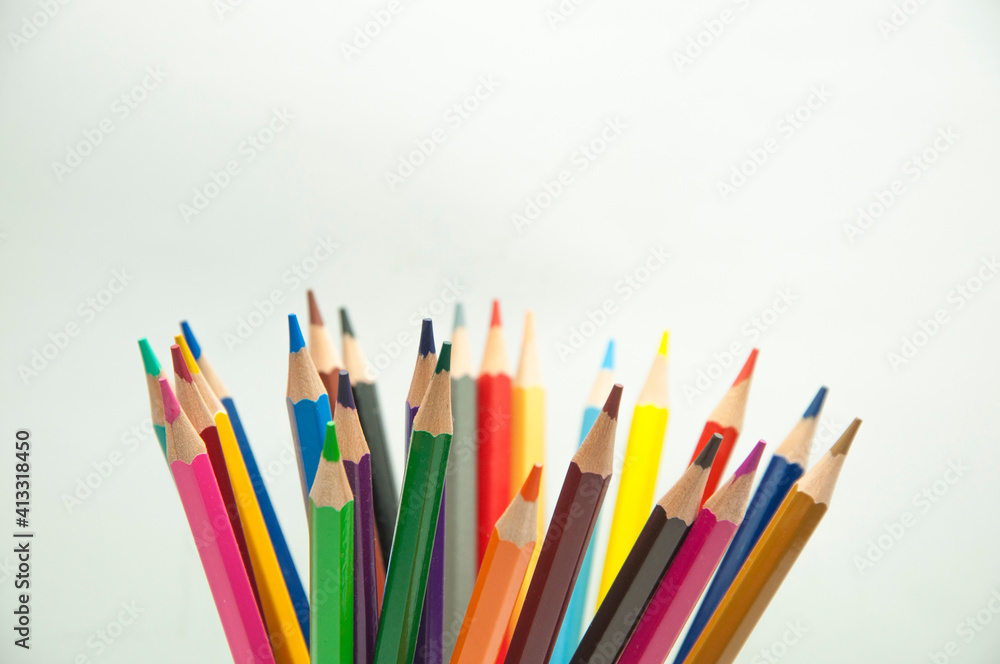 colored pencils on a white background. education concept. illustration of training. colored pencils on a white background. education concept. illustration of training.