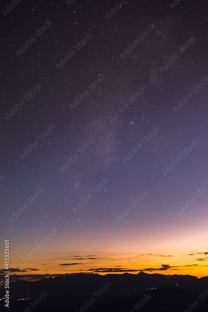 Starry colorful sky with early morning light.