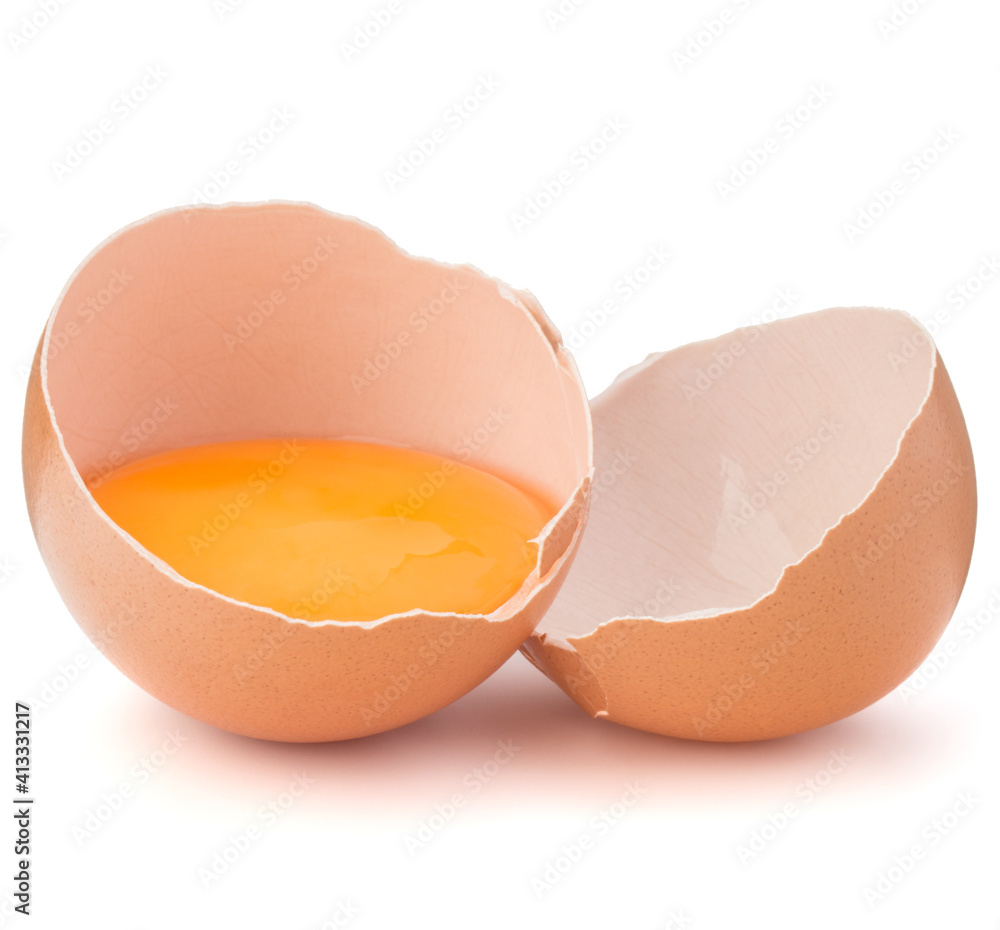 Broken egg in eggshell half isolated on white background cutout Broken egg in eggshell half isolated on white background cutout