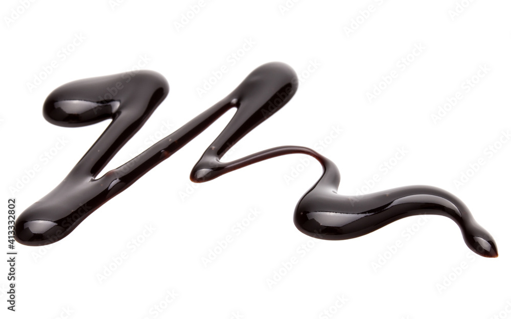 Chocolate syrup drop isolated on white background Chocolate syrup drop isolated on white background
