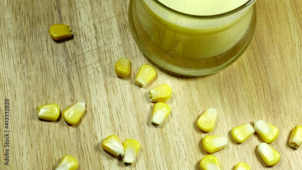 4K fresh organic corn smoothie hignt vitamin on wood backgond 4K fresh organic corn smoothie hignt vitamin on wood backgond