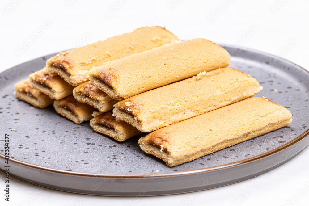 Cookies with fruit filling above white background Cookies with fruit filling above white background