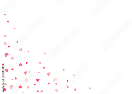 Pink hearts confetti of different sizes on a white background with copy space