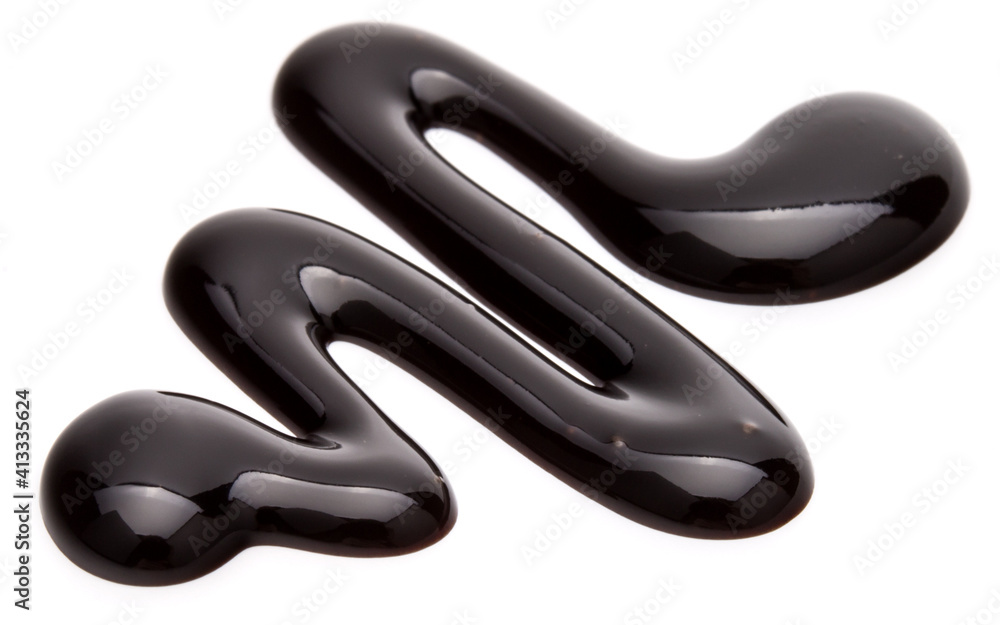 Chocolate syrup drop isolated on white background