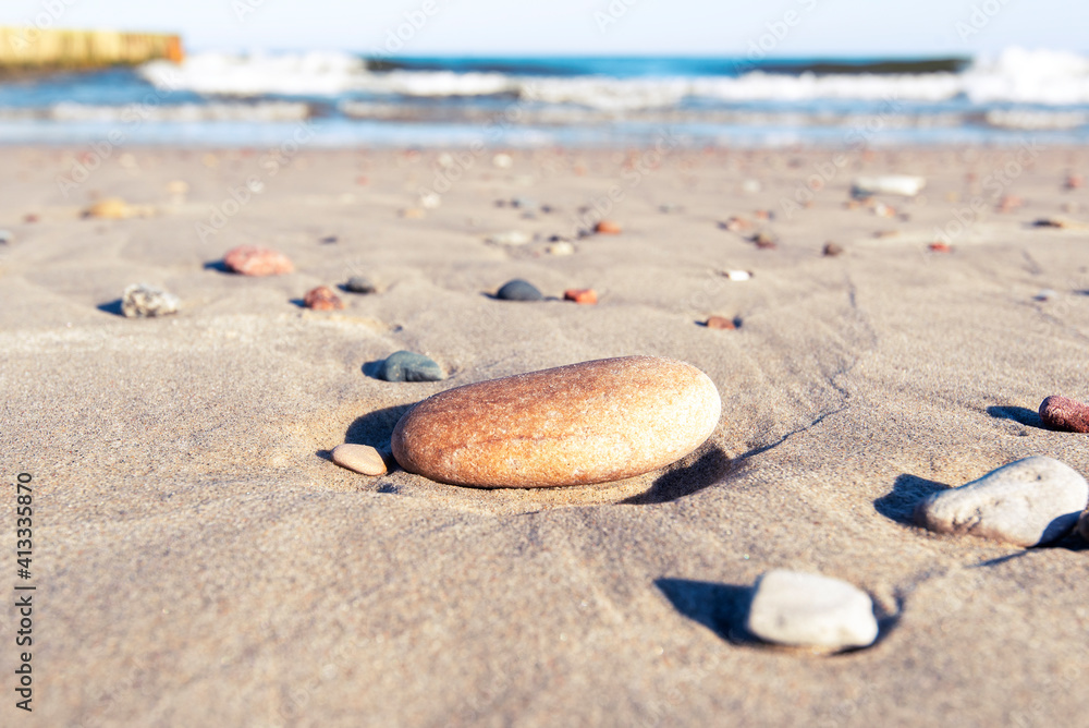 Stony coast of Baltic sea in Latvia, amazing sunset over sandy beach, nature, landscape Stony coast of Baltic sea in Latvia, amazing sunset over sandy beach, nature, landscape