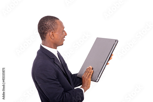 adult businessman looking at his laptop.