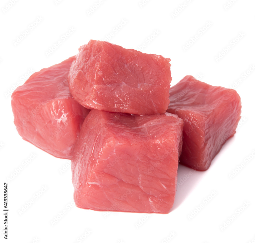 Raw chopped beef meat pieces isolated om white background cut out. Raw chopped beef meat pieces isolated om white background cut out.