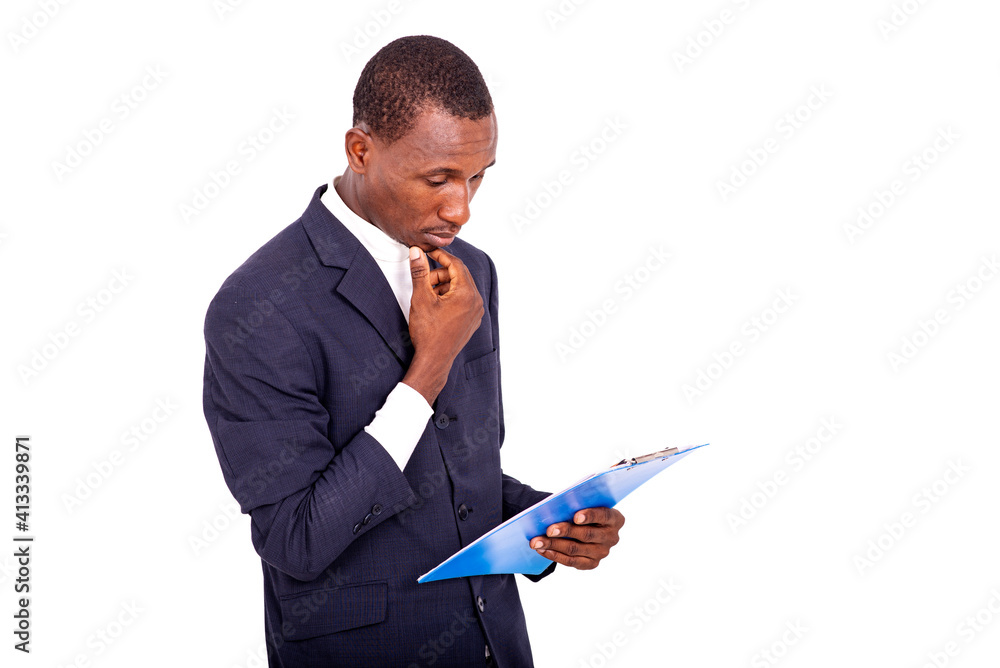 portrait of be businessman with note pad, thoughtful. portrait of be businessman with note pad, thoughtful.