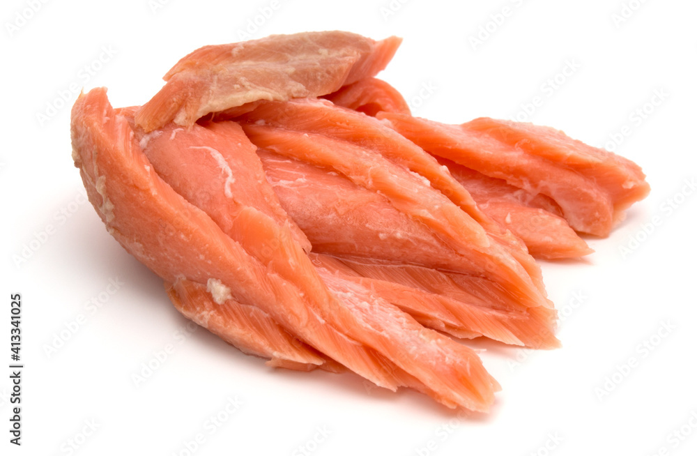 smoked salmon segments isolated on white background cutout. Prepared fish fillet fibres. smoked salmon segments isolated on white background cutout. Prepared fish fillet fibres.