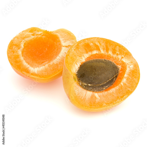 Two apricot fruit isolated on white background cutout