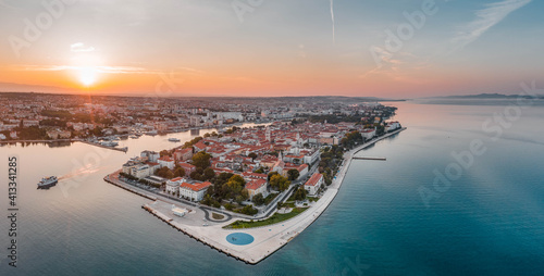 Aerial panoramic drone shot of Zadar old town sea organ in sunrise hour in Croatia Dalmatia area