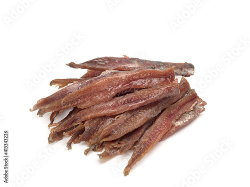 Salted anchovies on a white background. Top view