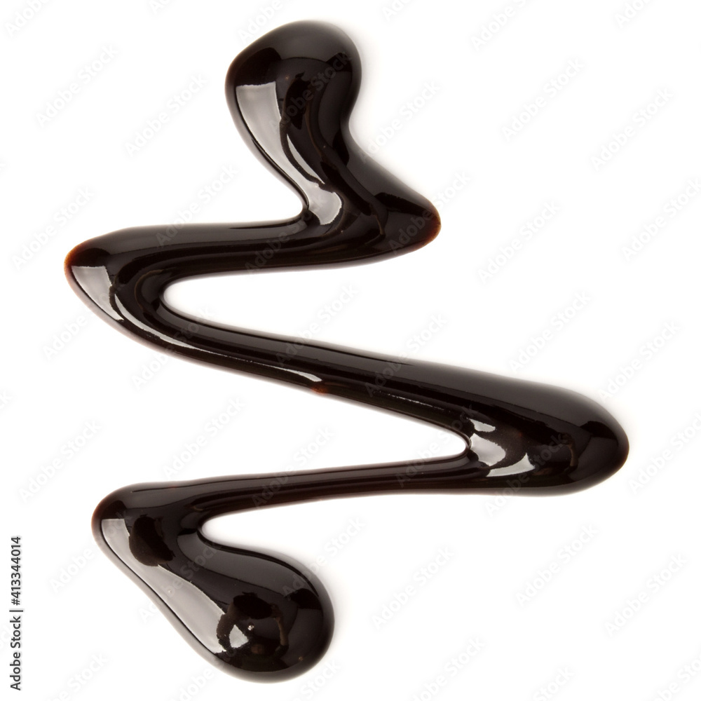 Chocolate syrup drop isolated on white background. Top view.