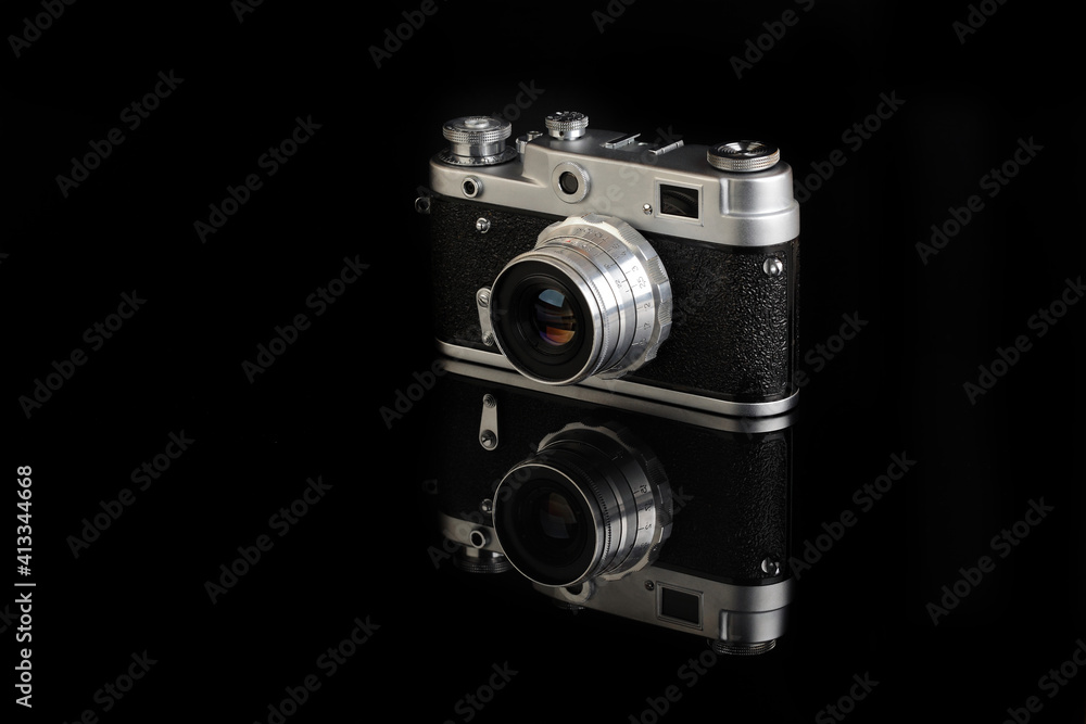 The very rare old rangefinder film camera on black background.
