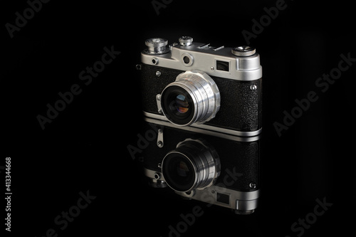 The very rare old rangefinder film camera on black background.