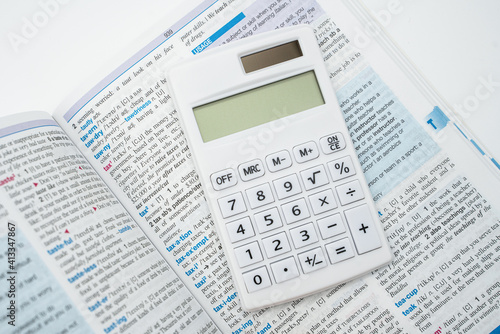  Dictionary definition of tax using calculator and English dictionary