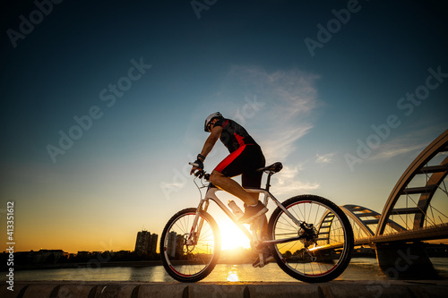 Fototapeta Naklejka Na Ścianę i Meble -  Man riding a mountain bike