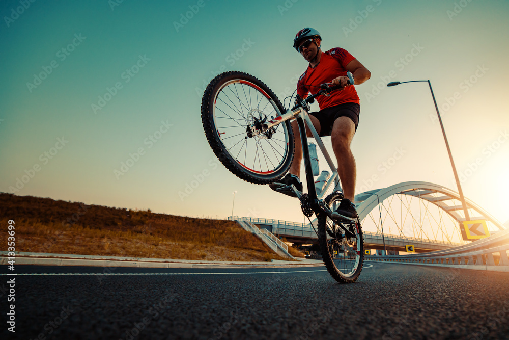 Man riding a mountain bike Man riding a mountain bike