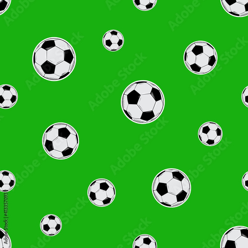 Seamless pattern of football balls on a green background