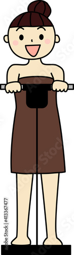 体脂肪率計付き体重計に乗る女性