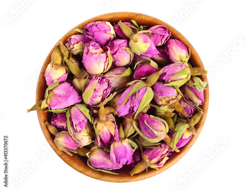 Dried (Dry) Rose Flower Buds in Wooden Bowl. Top View. Isolated on White.