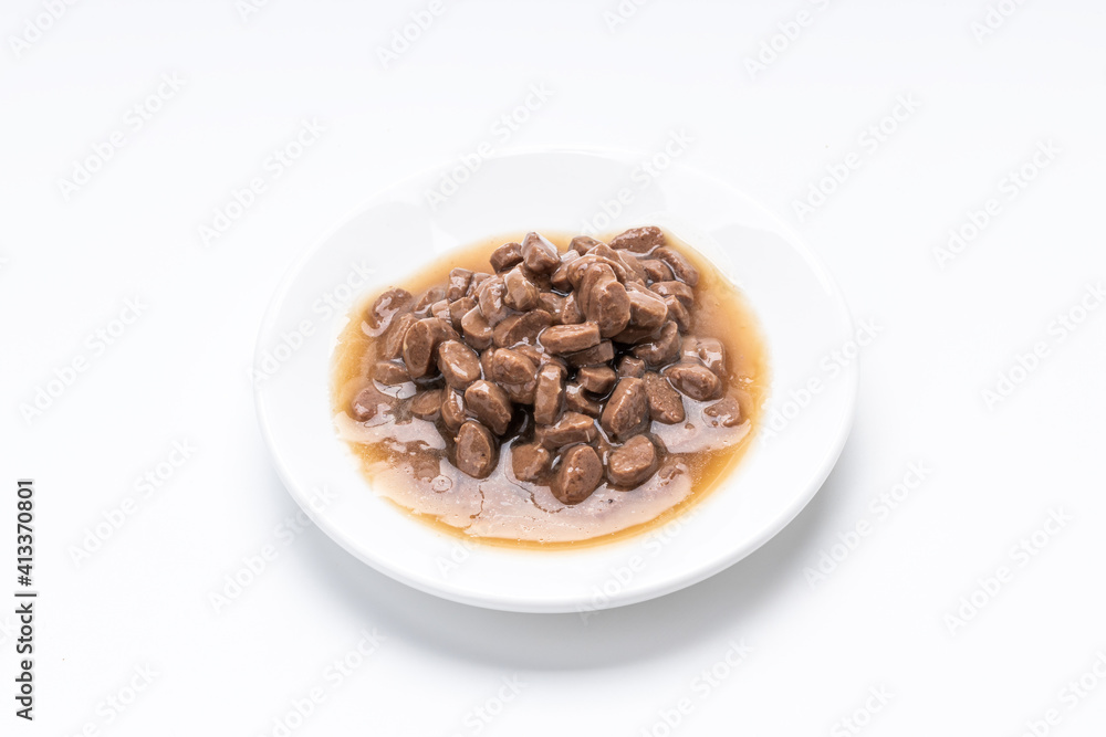 domestic animals wet food isolated on white background. wet cat feed cut out. above view domestic animals wet food isolated on white background. wet cat feed cut out. above view
