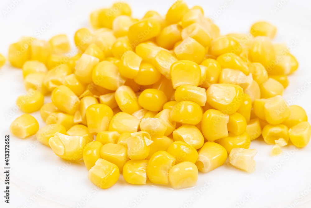 Cooked Sweet Corn above white background Cooked Sweet Corn above white background