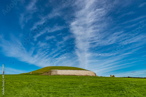 Photography Newgrange (Irish: Si an Bhru), a prehistoric monument in Ireland,  a UNESCO World Heritage Site