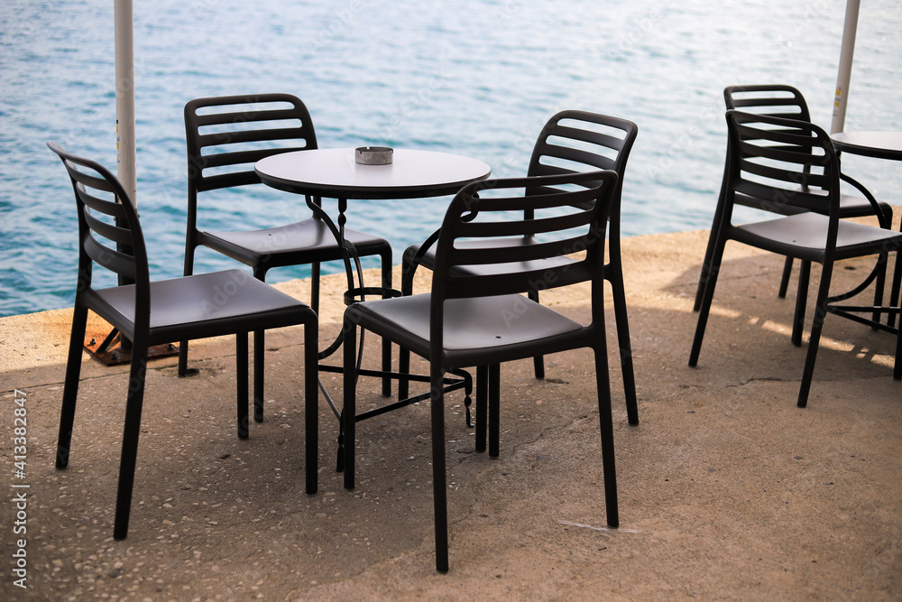 Table and chairs in outdoor cafe Table and chairs in outdoor cafe
