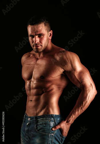 Naked Guy in denim jeans. Nude male torso. Sexy muscular man. Topless muscular fitnes model. Sexy naked body.