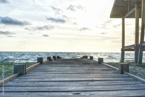 view of a small bridge to the beach