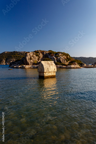 Lycian stone tomb in water, Kalekoy, Kekova, Antalya, Turkey.