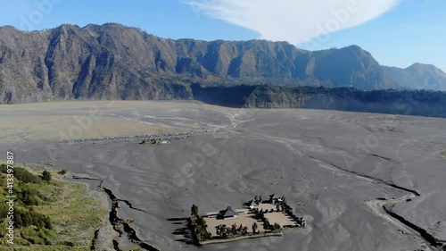 Aerial View Pura Luhur Poten Gunung Bromo, the Palace of the Gods in the Middle of the Ocean of Sand photo