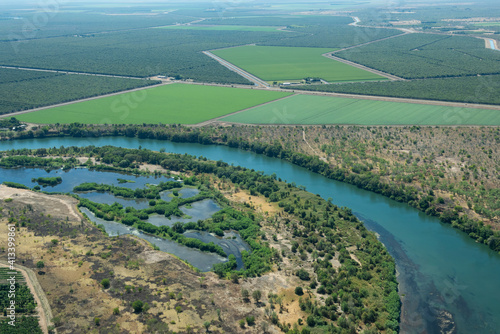 Western Australia, Kimberley. Aerial view of the Ord River and the fertile farmland at Kununurra. photo