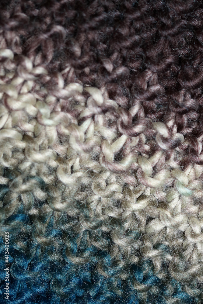 Colorful handmade winter scarf with alpacas wool macro background modern high quality prints Colorful handmade winter scarf with alpacas wool macro background modern high quality prints