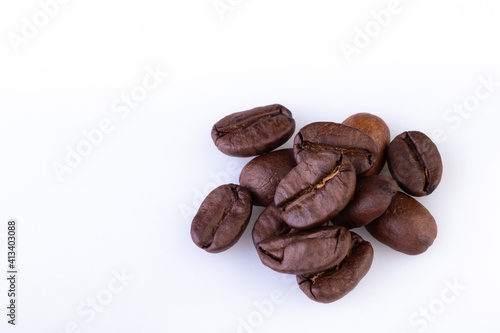 Close up of Arabica Coffee Beans Arranged on a white background