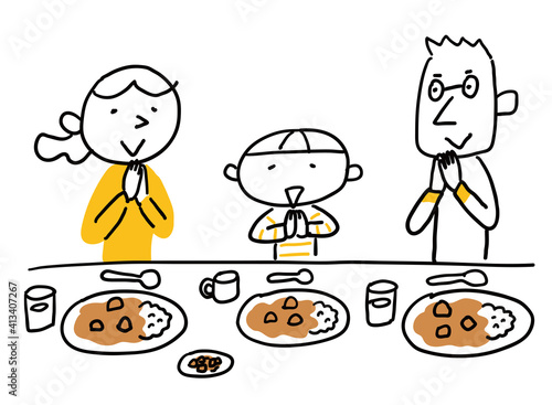 カレーを食べる家族