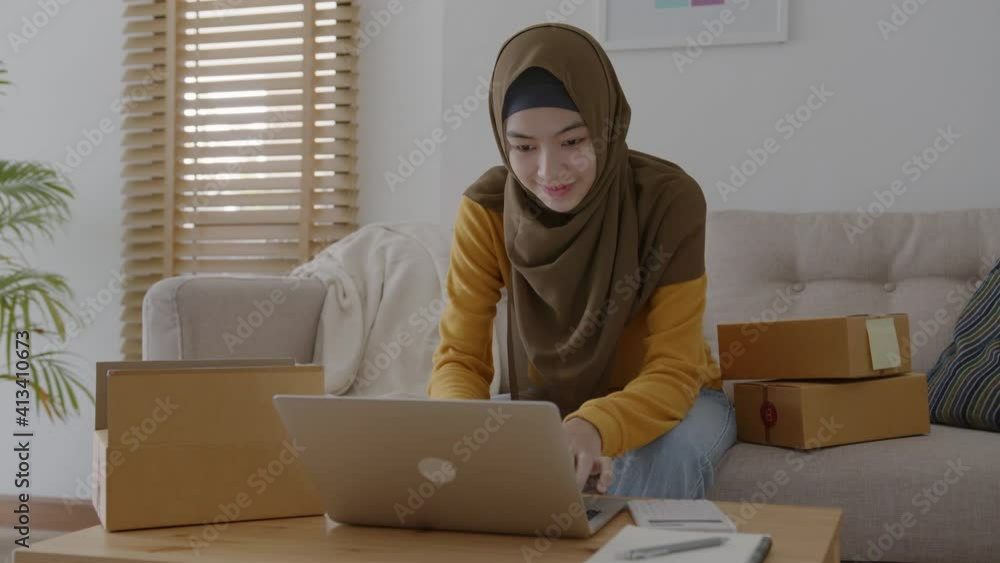 Muslim young women wear hijab using typing and checking order the ...