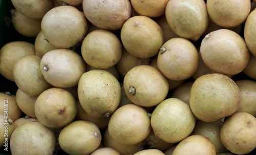 fresh lemons are sold in the market