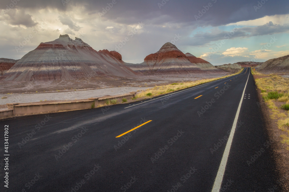 The highway passes through the Painted Desert of Petrified Forest National Park, Arizona