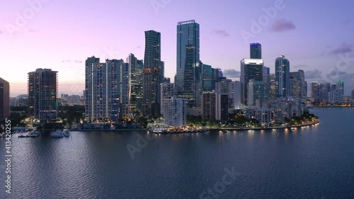 Wallpaper Mural Downtown Miami at pink sunset. Scenic Miami skyline panorama. Aerial view of downtown at night scene. Beautiful urban landscape of coastal bay city at dusk. City lights in purple sunset light. Florida Torontodigital.ca