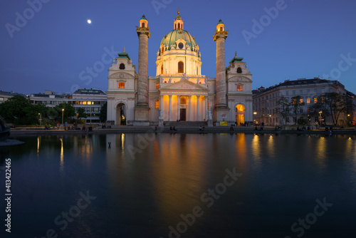 View of the Catholic church Karlskirche (1737) on an April evening. Vienna, Austria