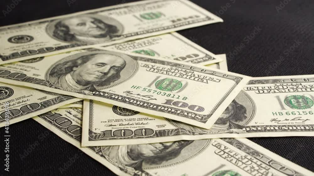 One hundred American dollar bills. dollars banknotes. 100 American dollars. Franklin. paper money, currency, cash. finance, payments. close-up