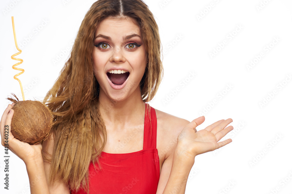 Beautiful woman with coconut cocktail in hands wavy hair cosmetics attractive look lifestyle leisure Beautiful woman with coconut cocktail in hands wavy hair cosmetics attractive look lifestyle leisure