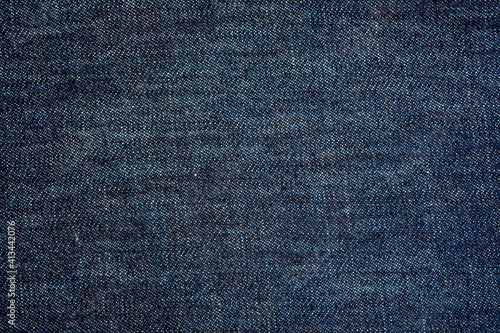 Denim blue jeans fabric. Denim background texture for design. Canvas denim. Blue jeans texture for any background. © Elena