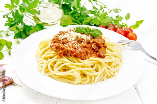 Spaghetti with bolognese on white board