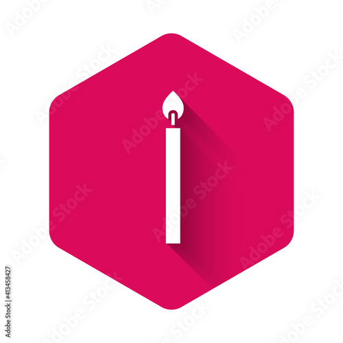 White Burning candle icon isolated with long shadow background. Cylindrical candle stick with burning flame. Pink hexagon button. Vector.